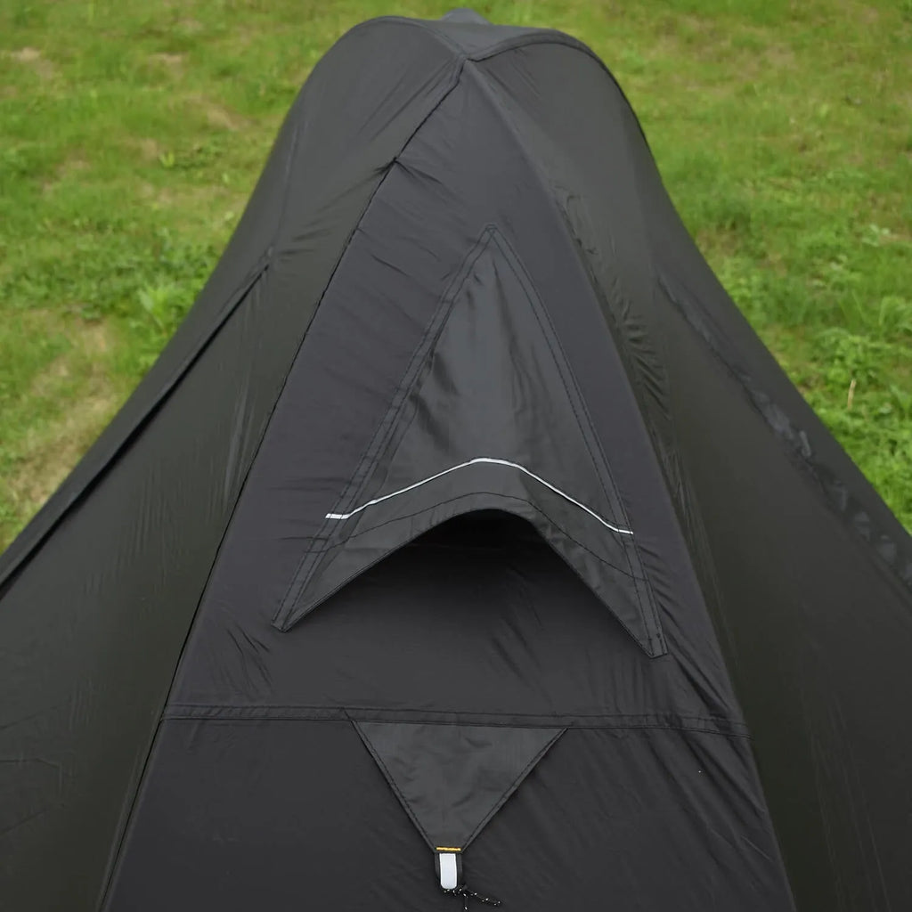 Single person double skin tent with aluminium poles in a red colour option, shown erected.