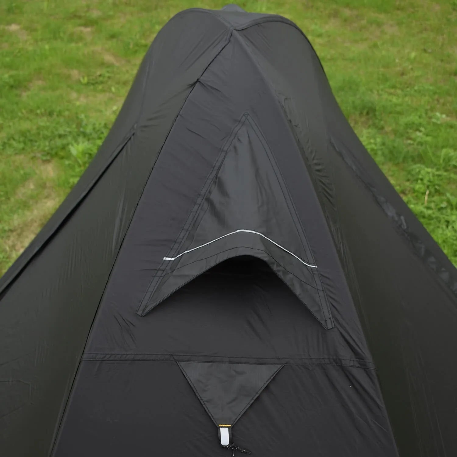 Single person double skin tent with aluminium poles in a red colour option, shown erected.