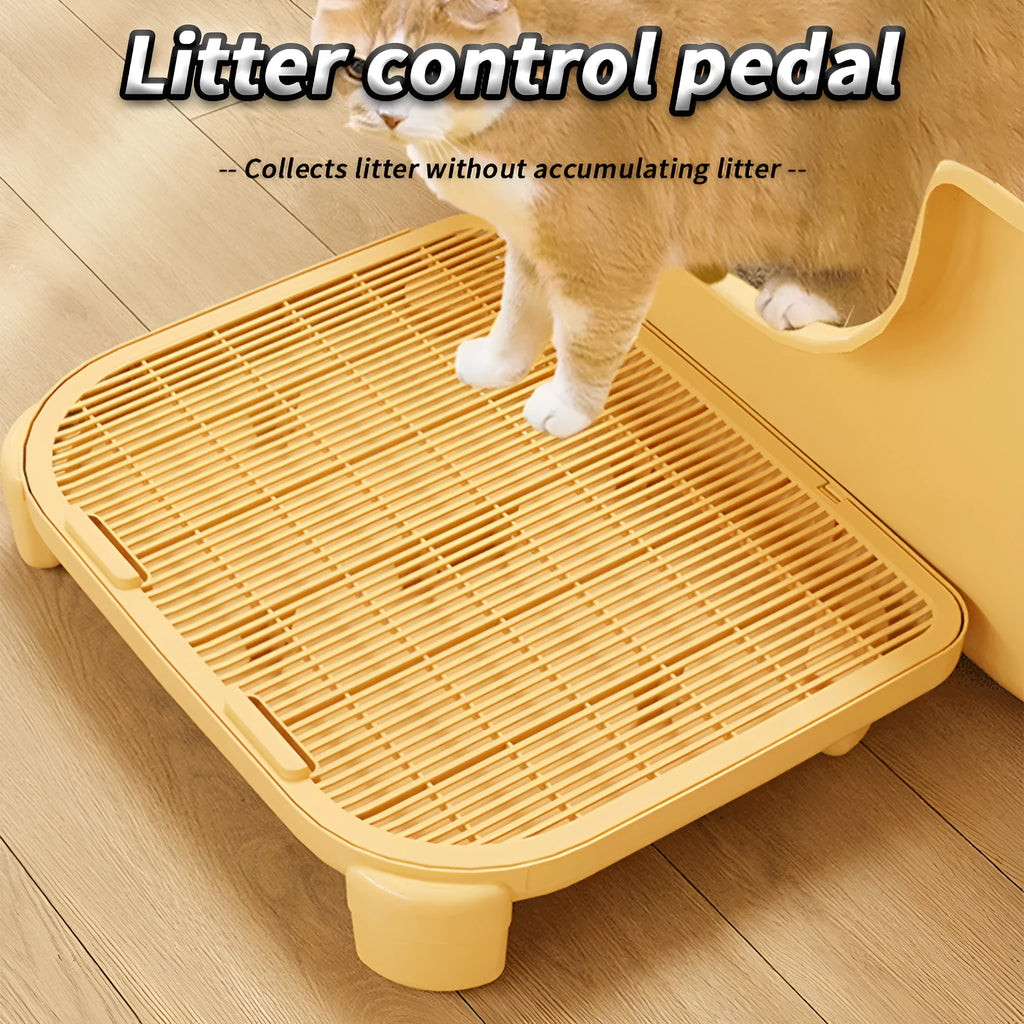 Grey cat litter mat with textured surface and silicone anti-slip feet on a hardwood floor.