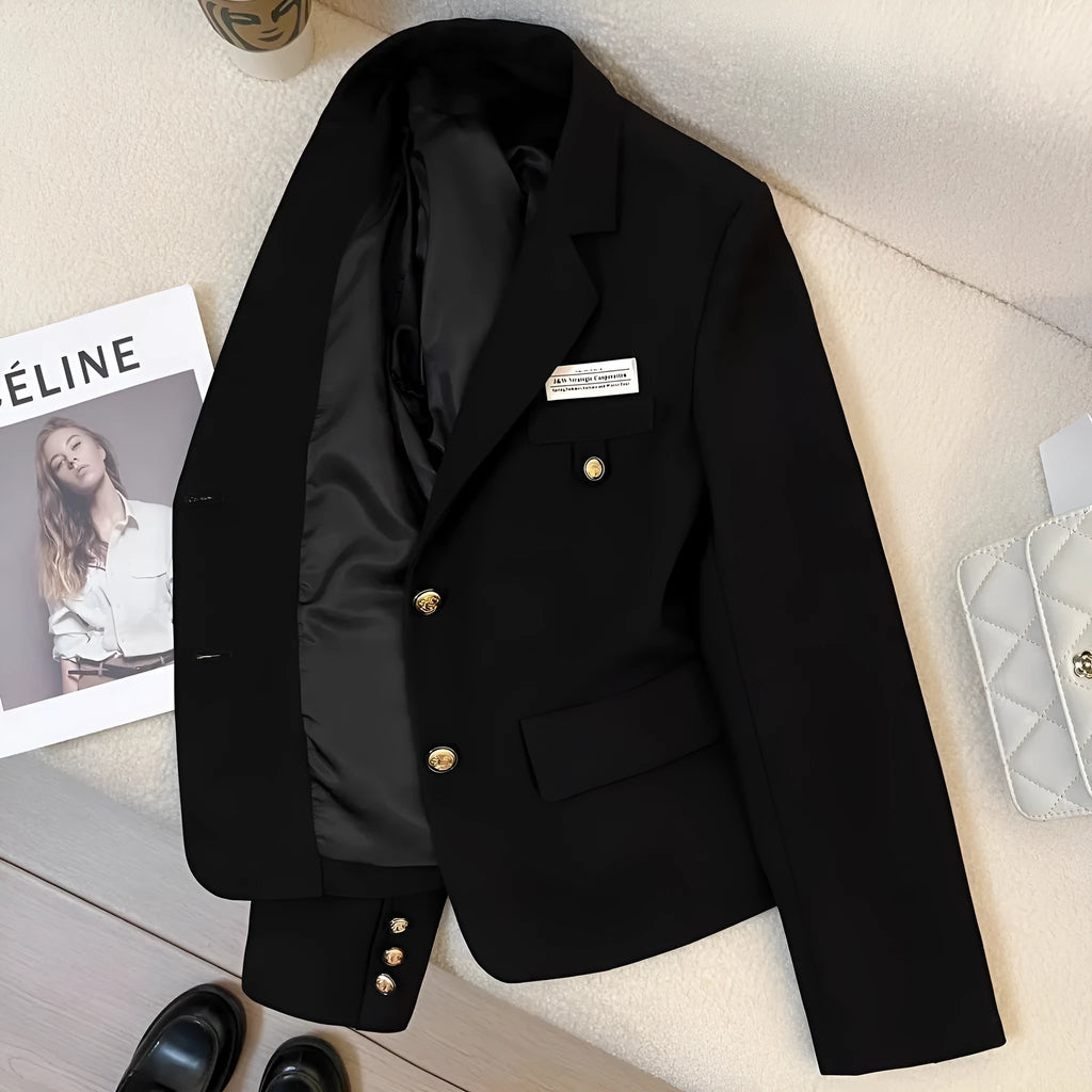 Women's black short suit coat with loose fit design and regular sleeves