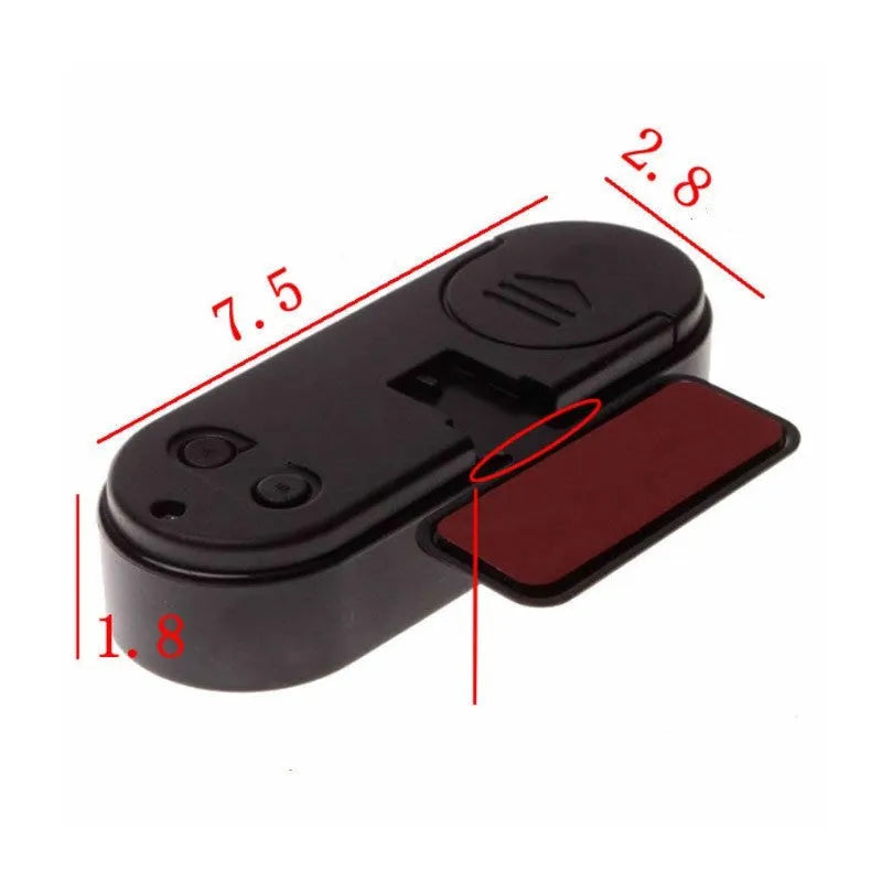 Black electronic car dashboard clock and thermometer unit with digital LED display on an adjustable bracket.