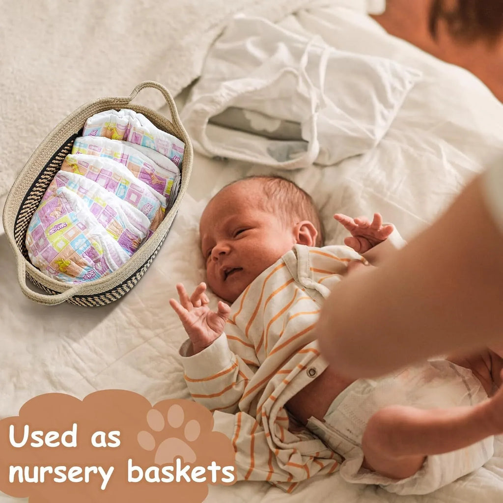 Handmade light beige woven cotton rope storage basket with a wooden handle