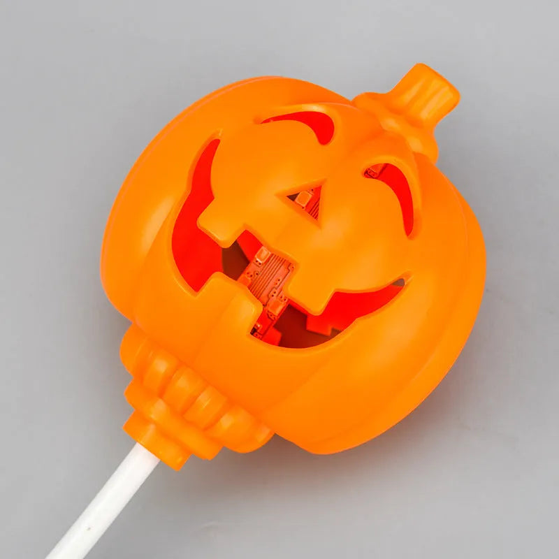 Plastic pumpkin-shaped decorative lamp with USB charging port, shown with purple or yellow light option.