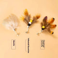 Three steel wire cat toy replacement heads with small flying insect designs