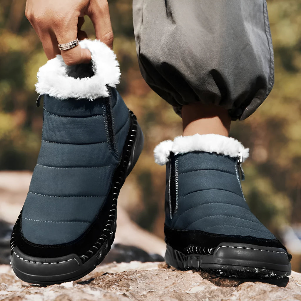Men's plus size snow boot in blue with round toe, flat heel, and non-slip rubber sole
