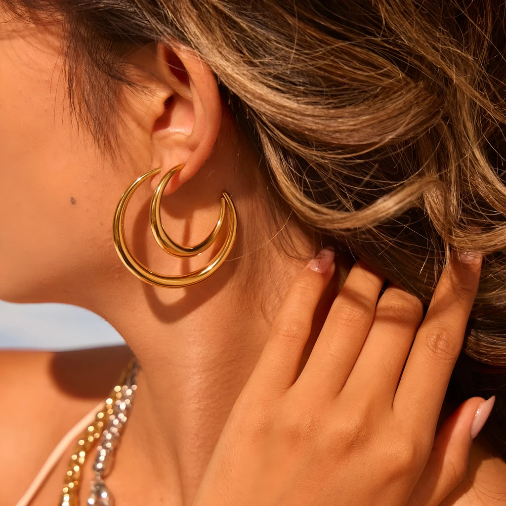 Titanium steel hoop earrings with geometric round design in gold and steel colour options