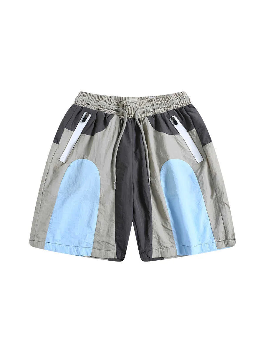 Blue patchwork quick-drying beach shorts with loose straight-leg fit and micro-elastic waistband