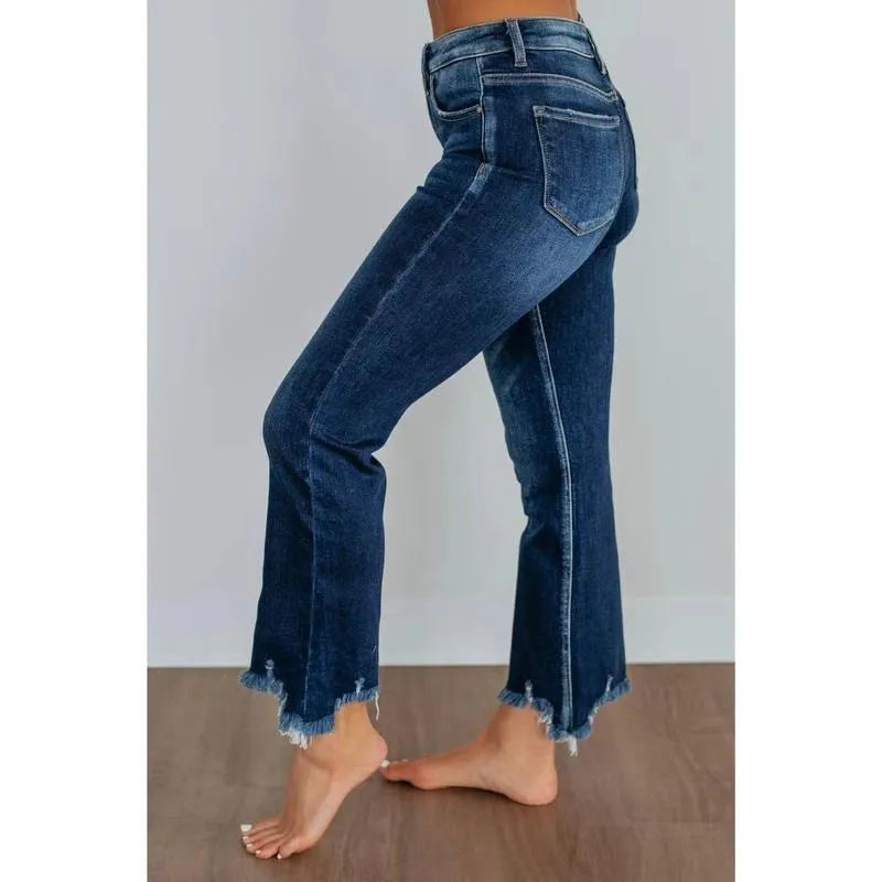 Casual women's denim trousers with hand-worn detailing in dark blue cotton fabric