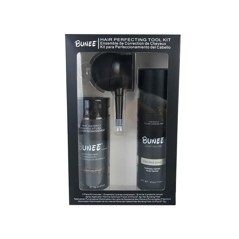 Boxed set of hair building fibre powder, styling spray and nozzle for volumising thin hair.