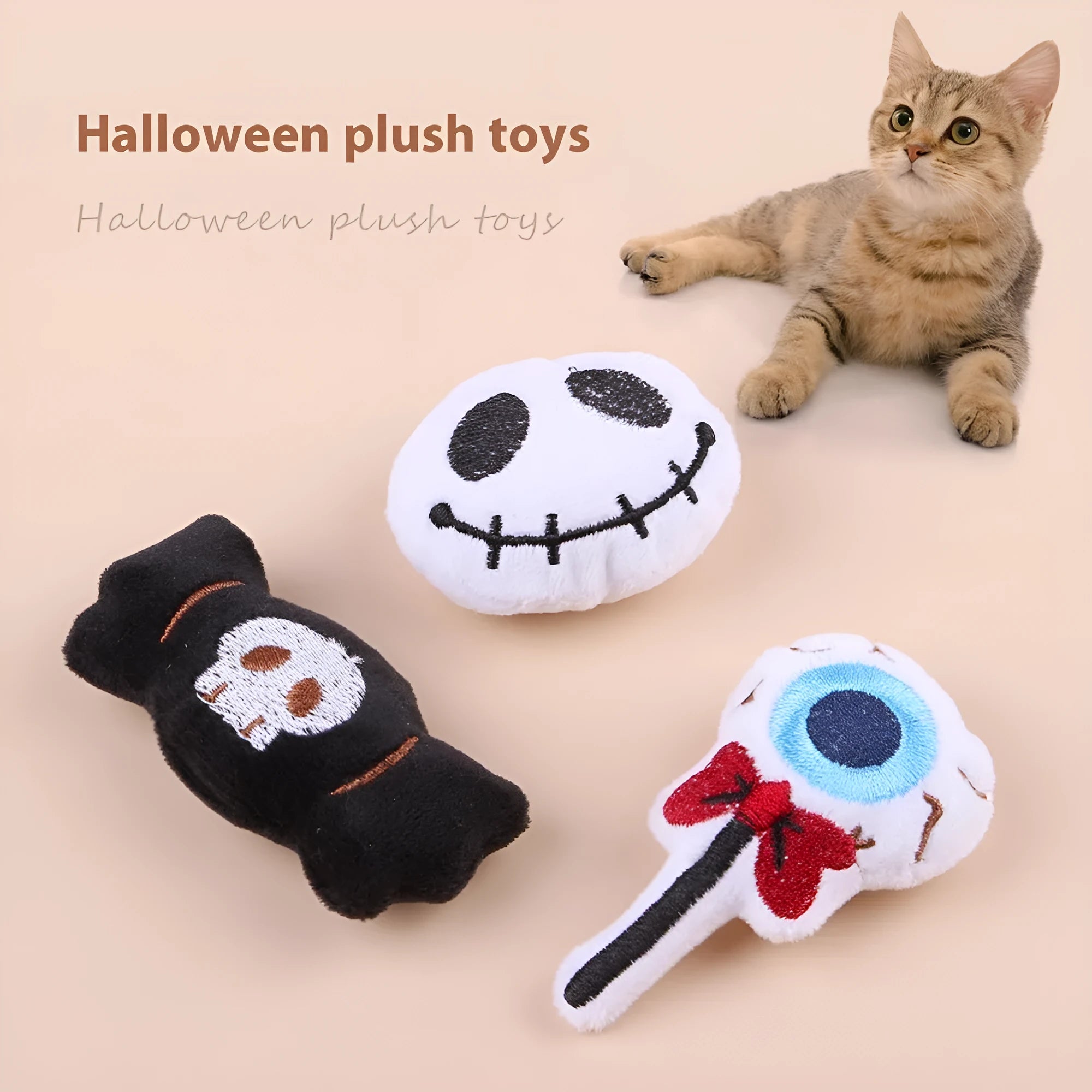 Small plush cat teaser toy with colourful candy or skull design on string