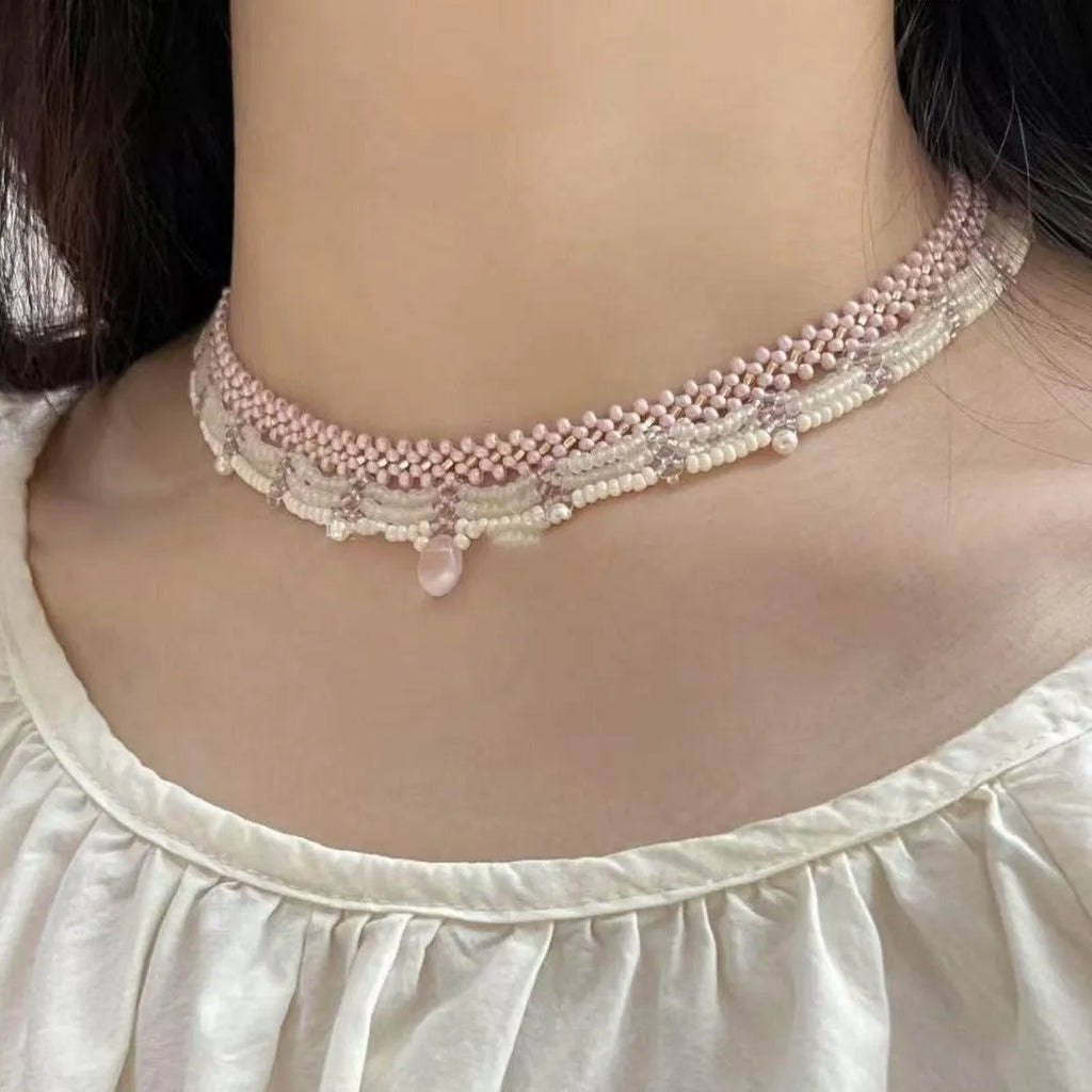 Hand-woven glass beaded wave necklace in pink with alloy pendant and matching bracelet