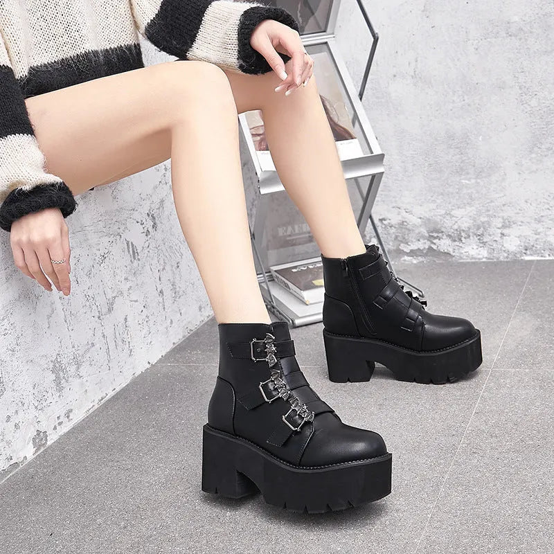Black women's punk bat buckle gothic short boots with side zip and thick heel.