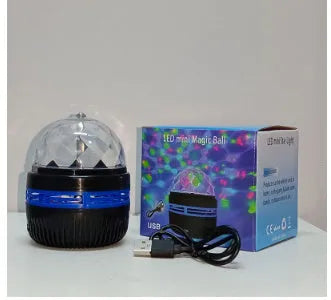 LED galaxy projector lamp with rotating star patterns and USB power cable