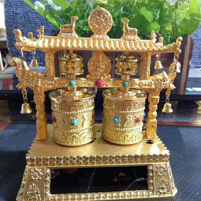Traditional Chinese electric alloy prayer wheel car decoration measuring 12x15x8cm