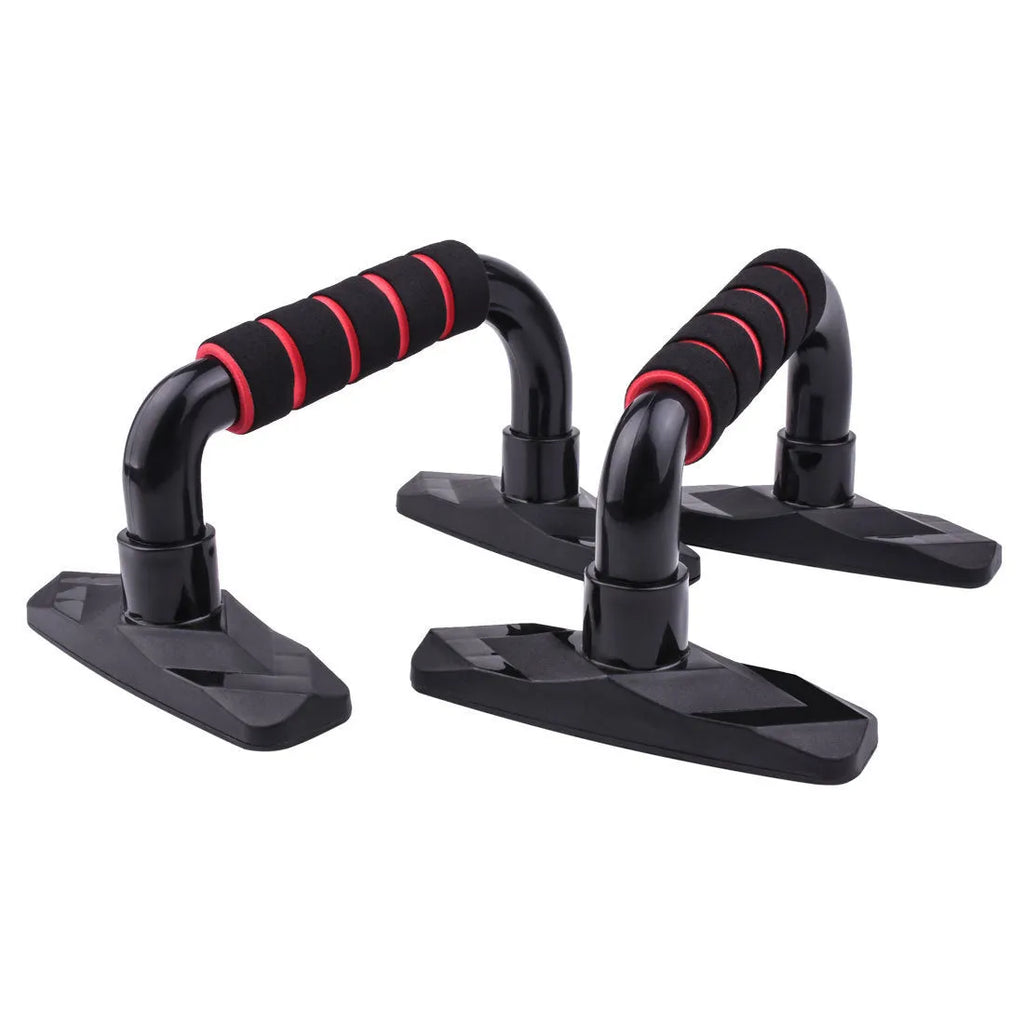 Two I-shaped push up bars made of blue PP sponge, placed on a floor for exercise.