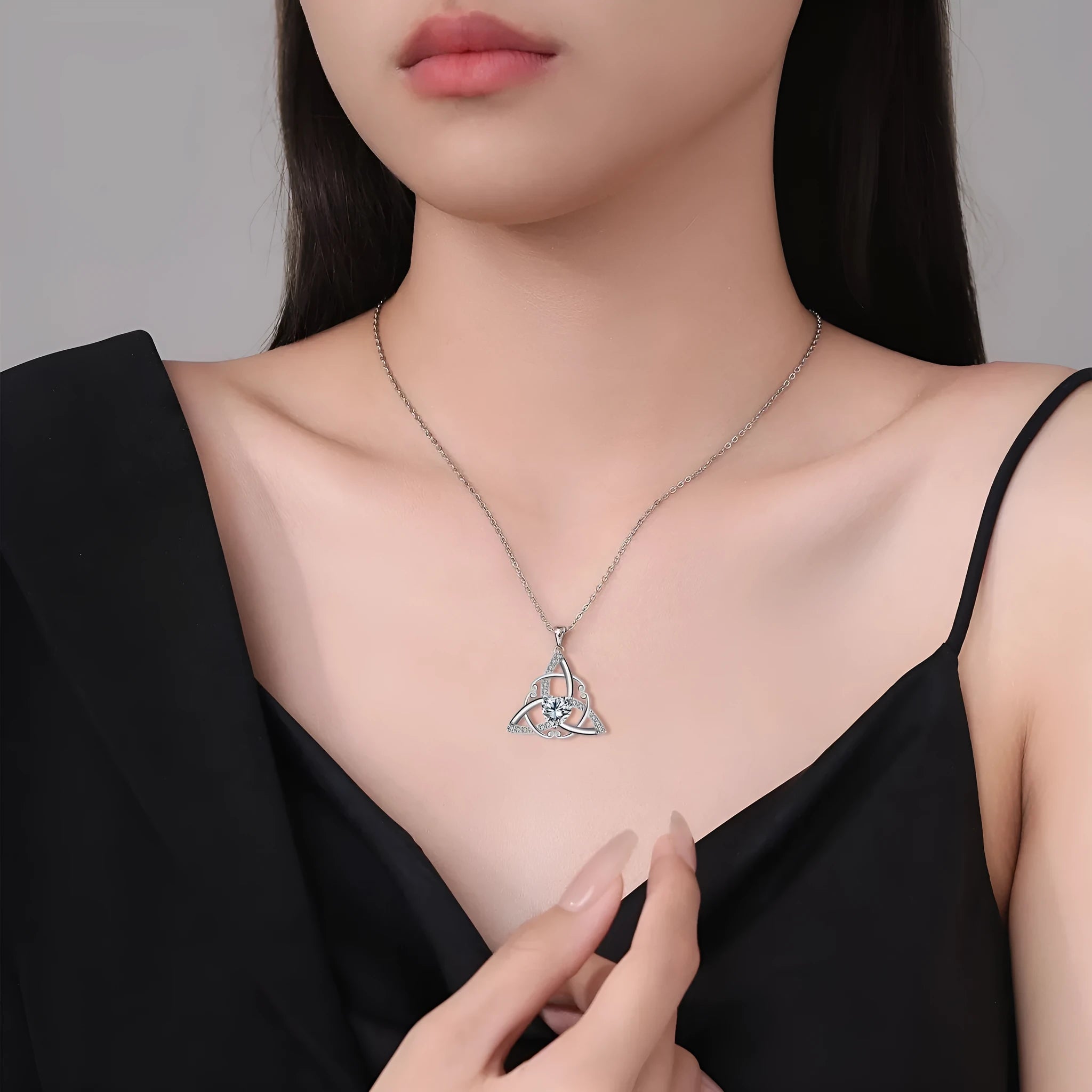 Women's Celtic knot necklace with geometric copper pendant in electroplated finish