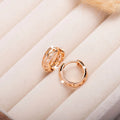 Copper heart and leaf shaped hollowed out earrings with rose gold plating