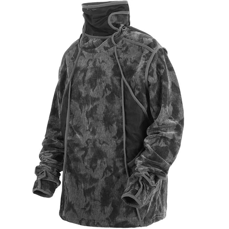 Men's black tie dye patterned pullover sweater with turtleneck and drop shoulders on a grey background.