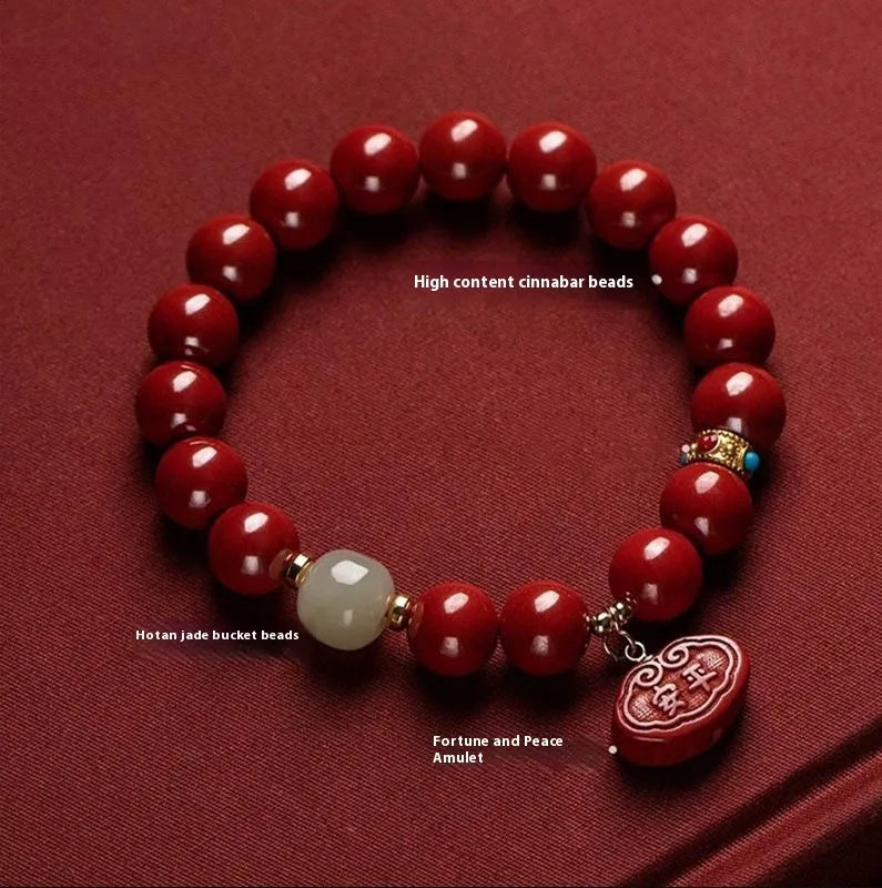 Natural cinnabar Emperor Sandstone Ping An Fu Lu bracelet with red beads.