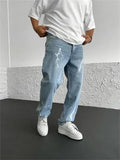 Men's blue straight-leg denim jeans with wide-leg silhouette and mid-waist design