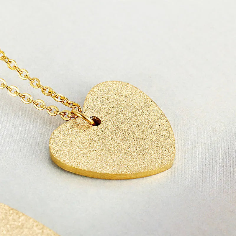 Geometric heart-shaped titanium steel necklace pendant in colour KN25736-Z.