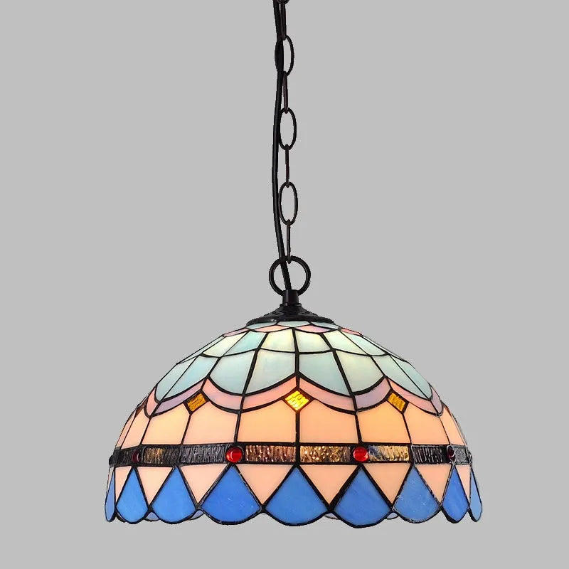 European baroque style chandelier with a coloured glaze finish and abstract design.