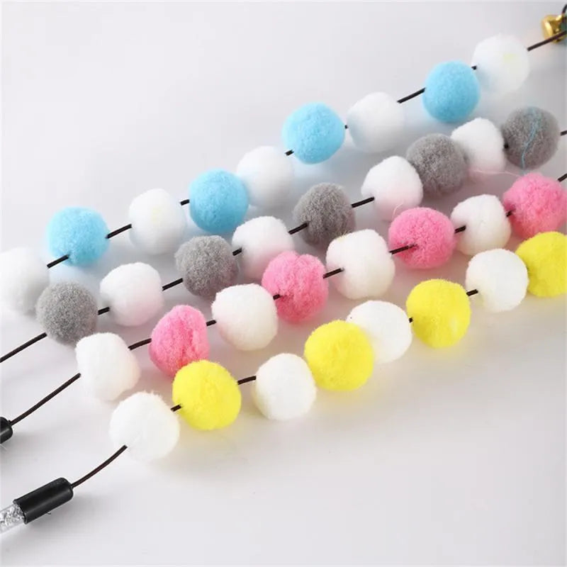 Blue cat feather teaser stick with bell measuring 31cm long for interactive play