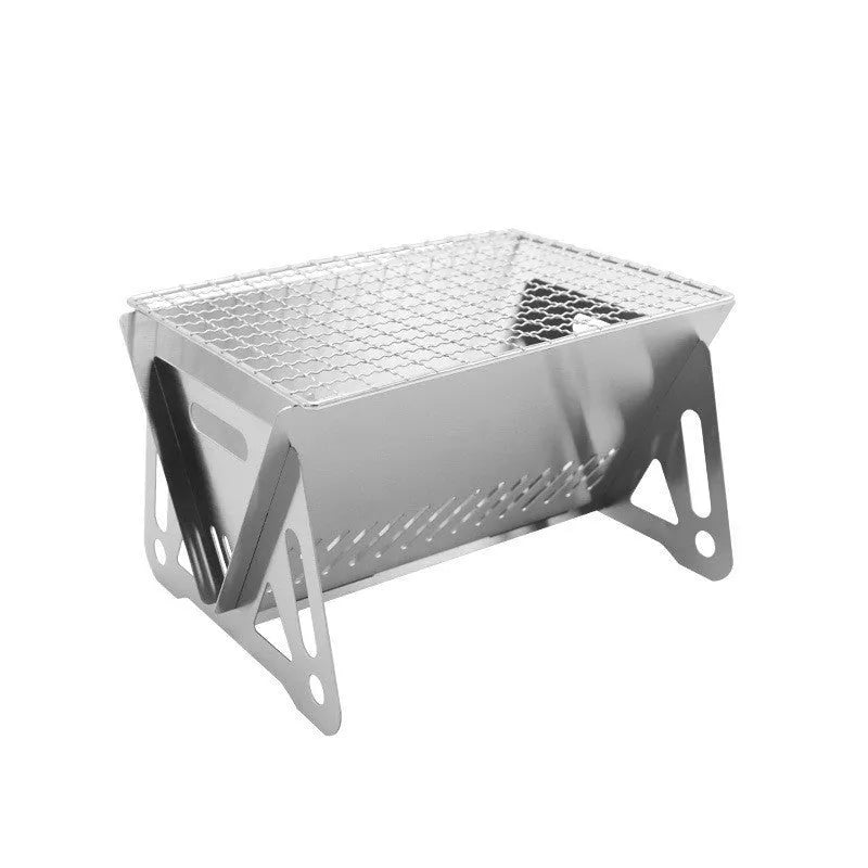Folding stainless steel outdoor barbecue oven with grill rack and storage bag.