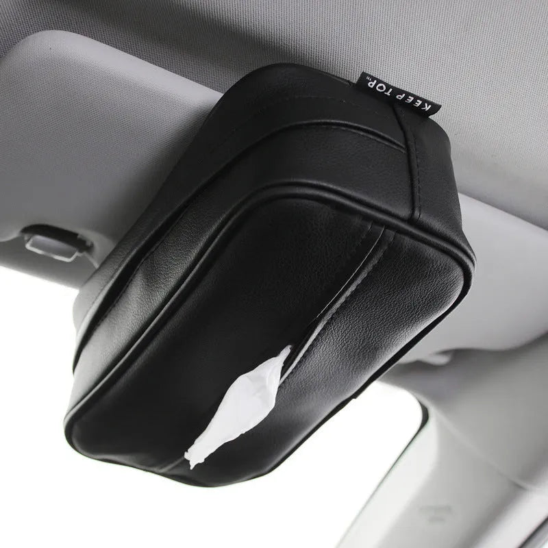Black PU leather car hanging storage box with zipper and hook, shown next to a measuring tape indicating 23cm length.