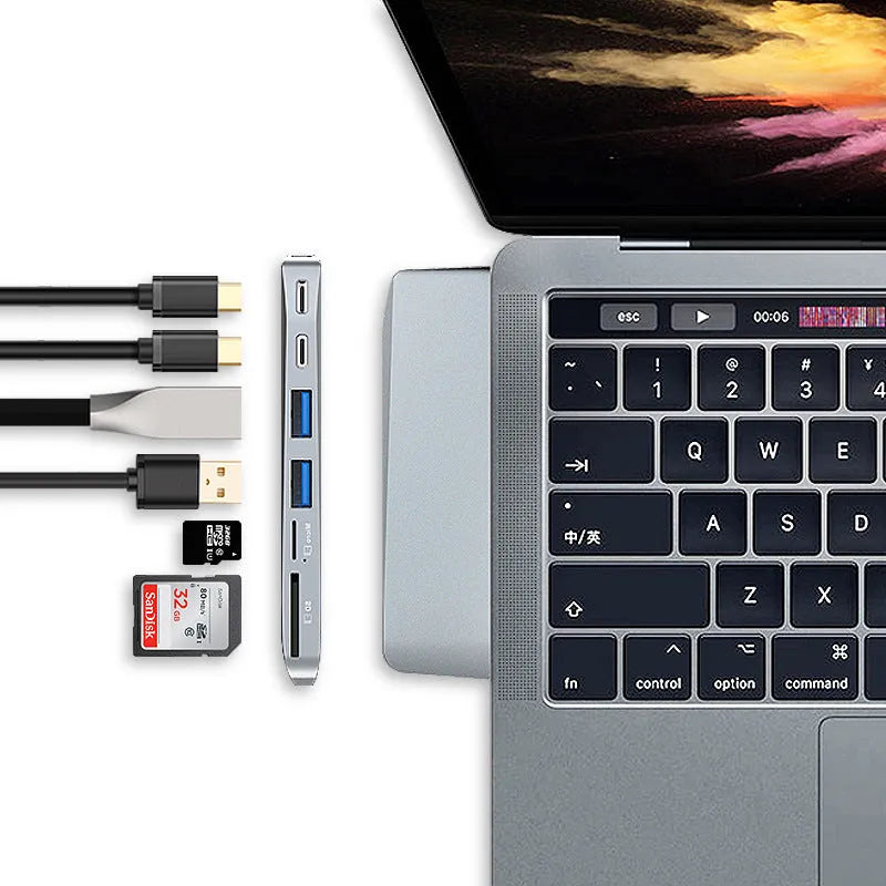 8-in-1 USB-C conversion hub with dual plugs for MacBook Pro laptops showing eight output ports