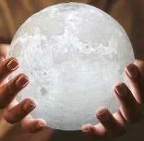 3D-printed white moon lamp on wooden stand with touch-sensitive metal ring base