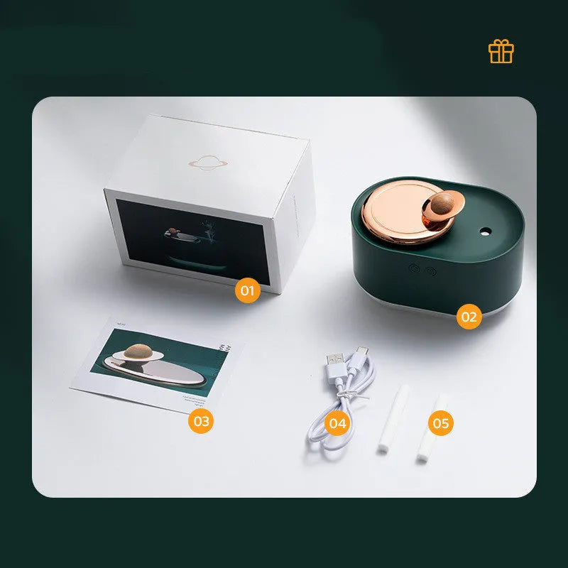 Green rotating planet-shaped USB humidifier with night light on a car dashboard