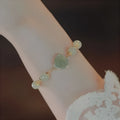 Women's floral bracelet in Hetian Jade Rose with 14K gold gilding and manual craftsmanship.