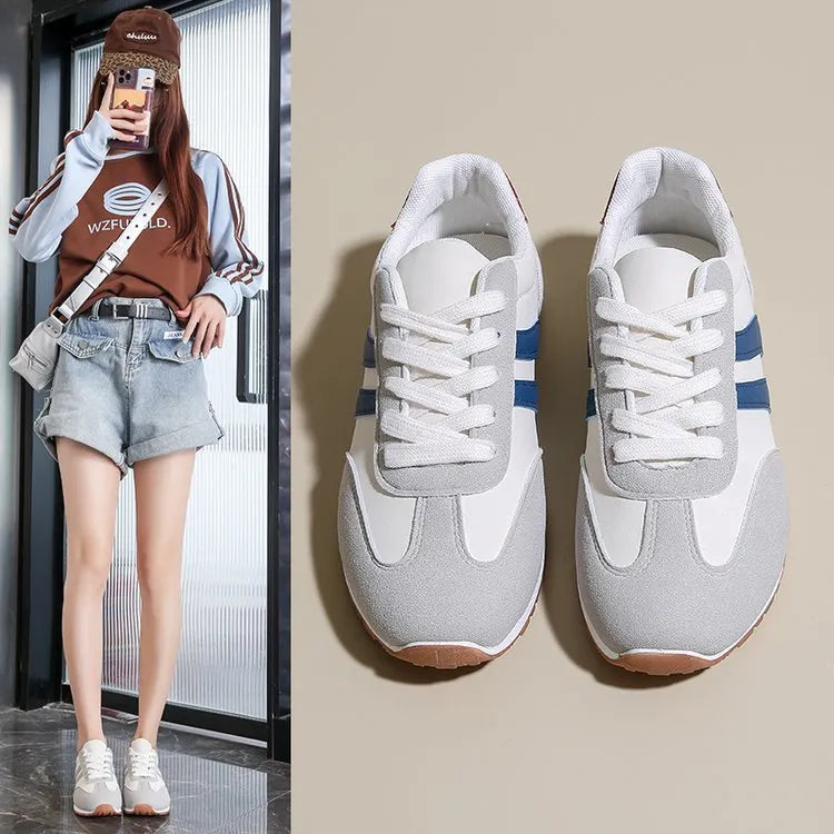 Blue and grey Cortez stripes leisure sports shoes with rubber sole and round toe.