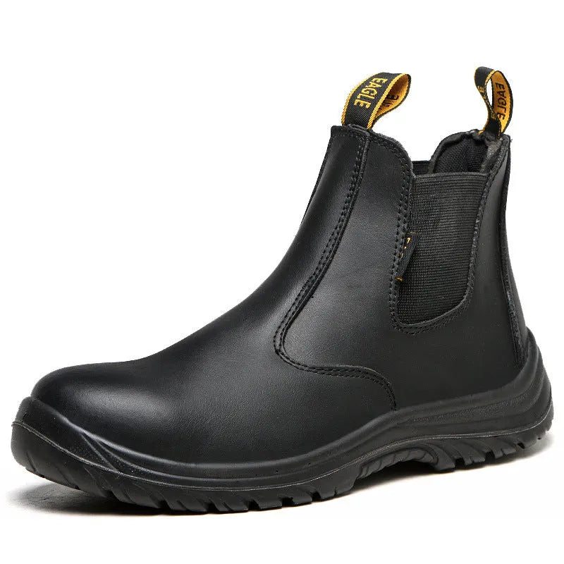 Black high-top leather safety work boots with anti-piercing sole on a work floor.