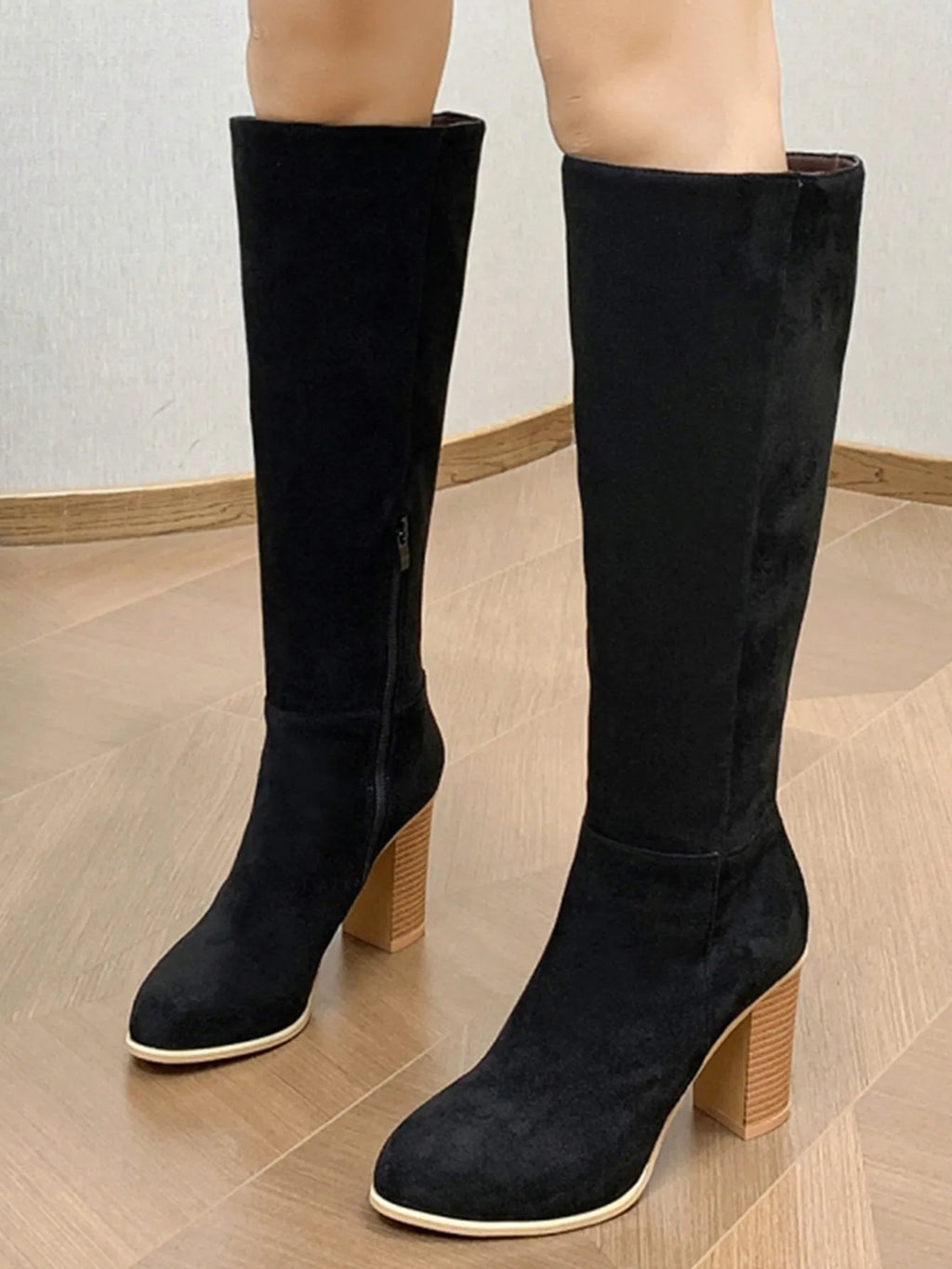 Women's black square toe high heel casual boot made of artificial PU.