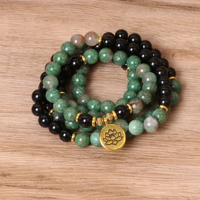 Green and black elastic beaded bracelet made from alloy material with natural styling