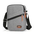 Oxford cloth crossbody commuter bag with contrast detailing in silver grey, black, or navy blue