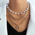 Vintage gold heart pendant necklace with pearl chain design in three colour options