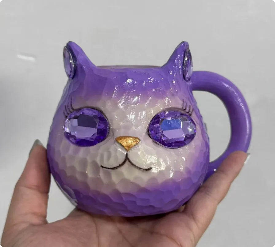 Resin cat cup gift with crystal Earth globe in blue, green, pink, or purple colour options.