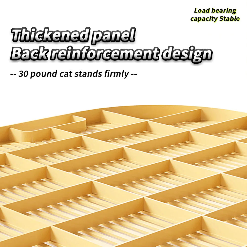 Grey cat litter mat with textured surface and silicone anti-slip feet on a hardwood floor.