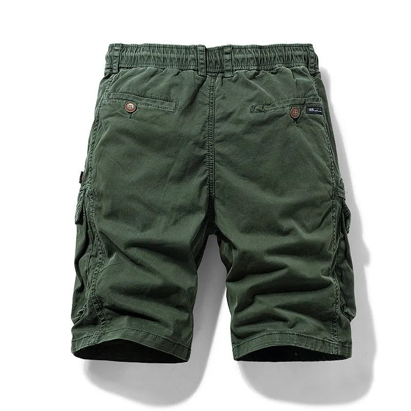 Men's cotton shorts in army green with multiple pockets and zip closure, showing fifth pants length and elastic waistband