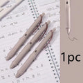 Macaron Colour press gel pen with 0.5mm tip in smoked white, brown, and pink options.