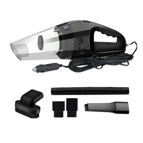 Orange handheld 12v car vacuum cleaner with nozzle attached on a car seat.