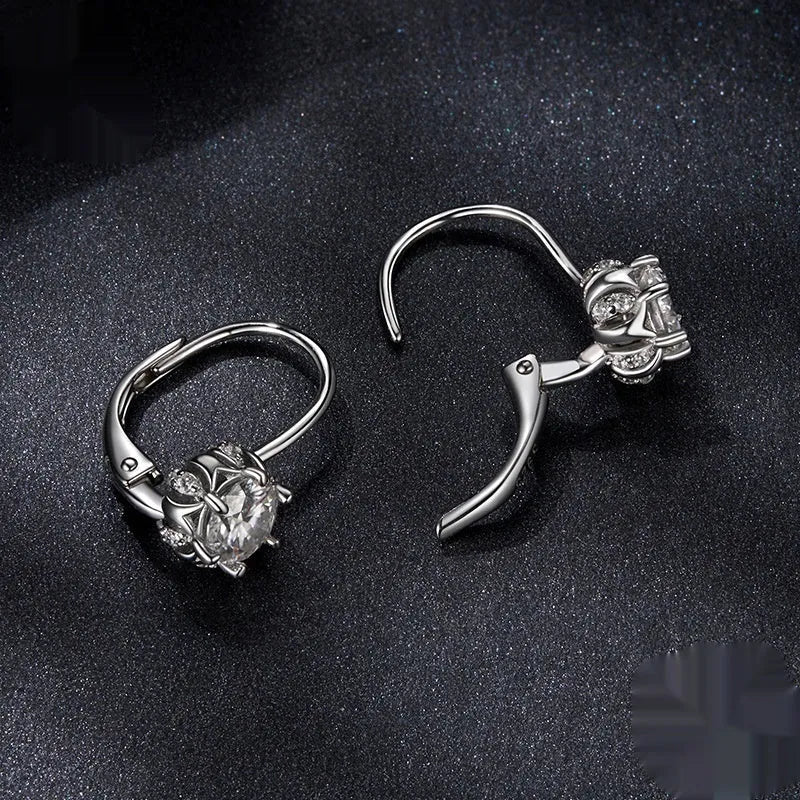 Sterling silver flower bud ear clip with white gold plating and moissanite stones