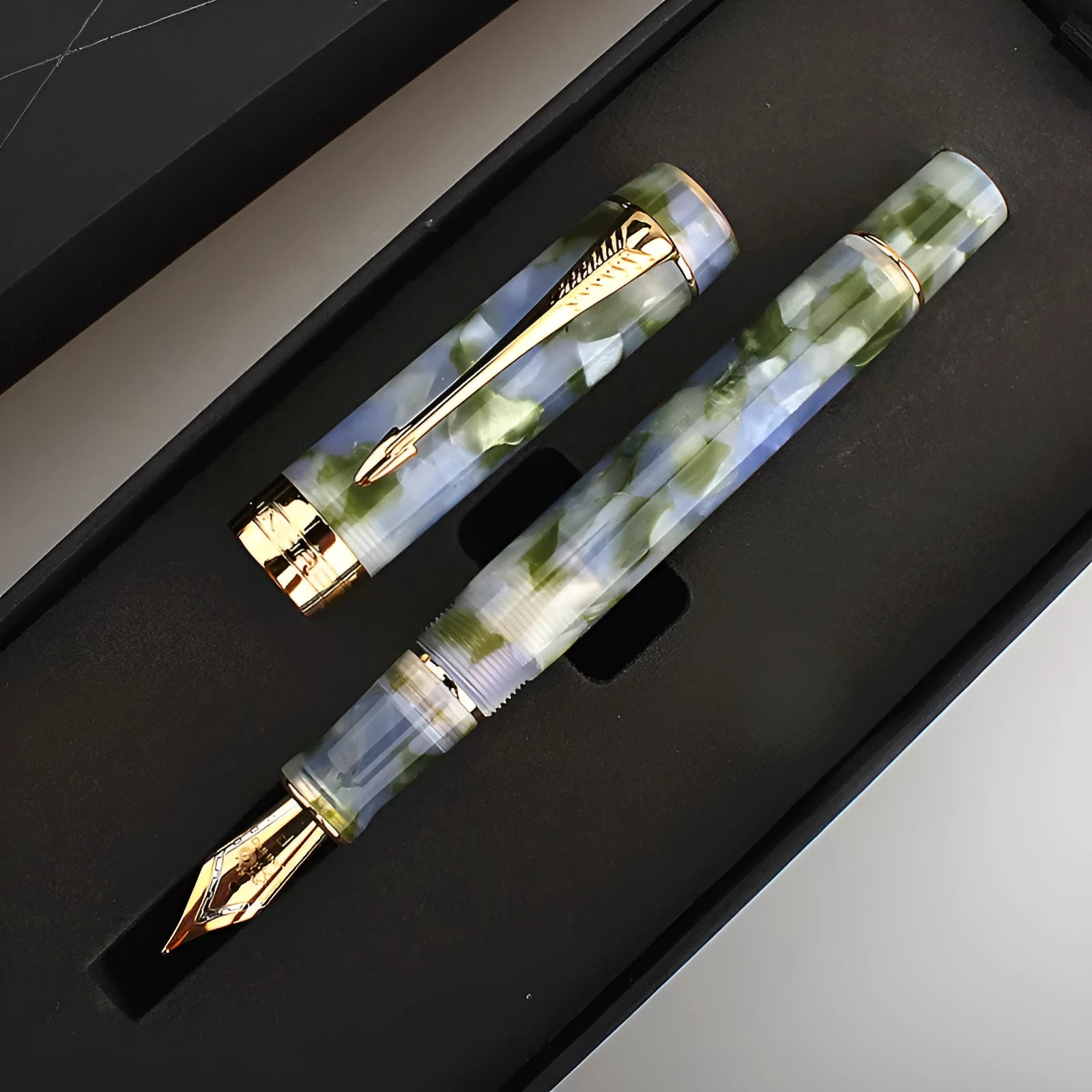 Deep bath green metal ballpoint pen showing three tip size options: 0.5mm, 0.7mm, and 1.0mm