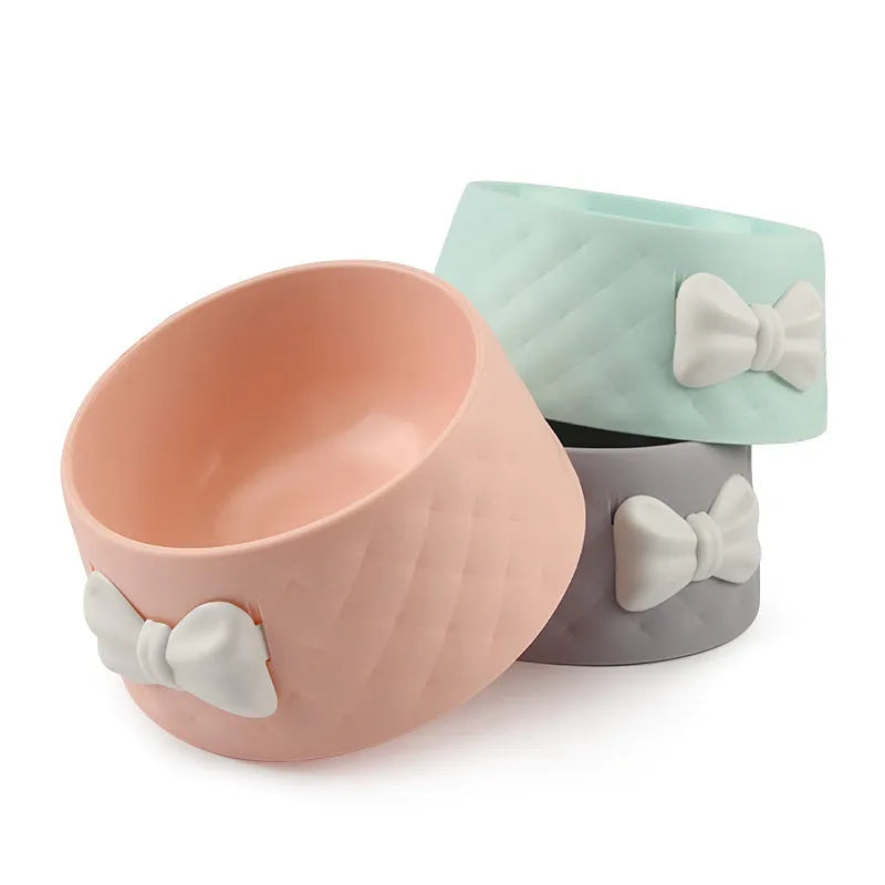 Bow design cat and dog bowl in PP plastic available in pink green and grey colours