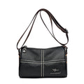 Casual genuine leather cylindrical shoulder bag for women in black, top grain, patchwork, soft texture.