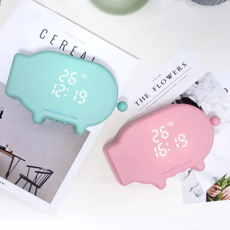 Blue multifunctional LED alarm clock showing time and temperature with USB charging port