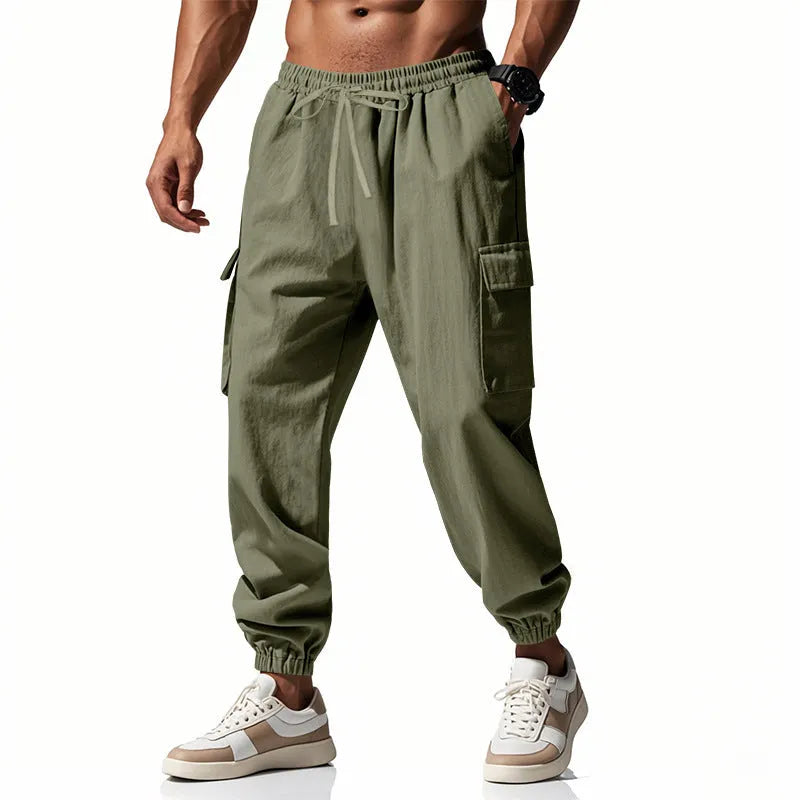 Men's linen casual trousers in Army Green with multi-pockets and an ankle tie closure.